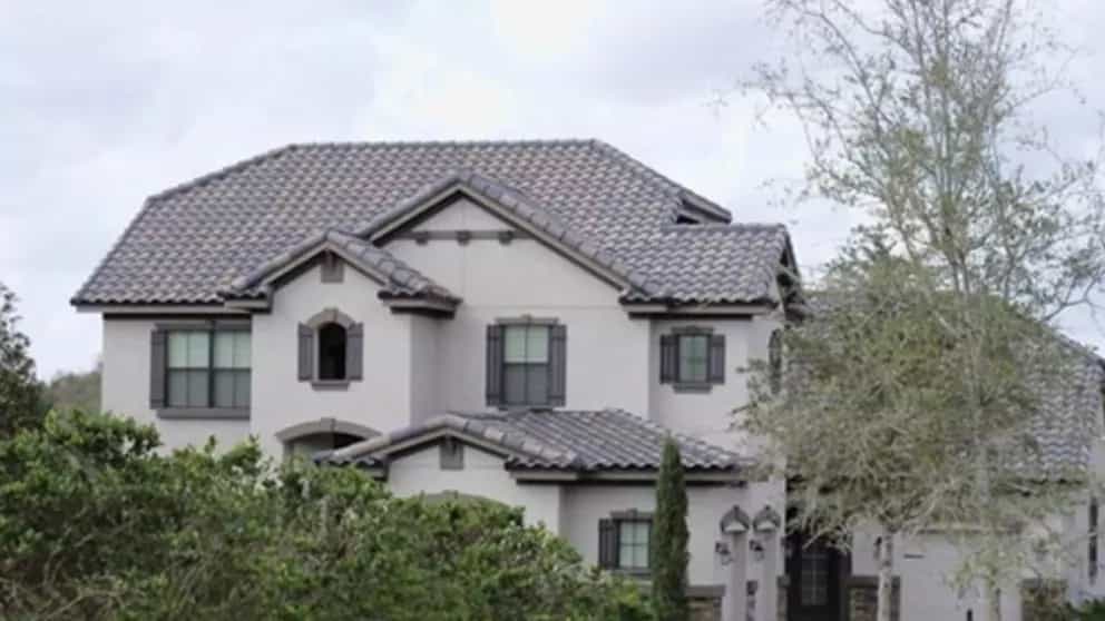 Which material is more suitable for a sloping roof?